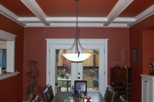 Nantucket dining room tranformed after adding Cape Cod red paint and white satin impervo oil paint